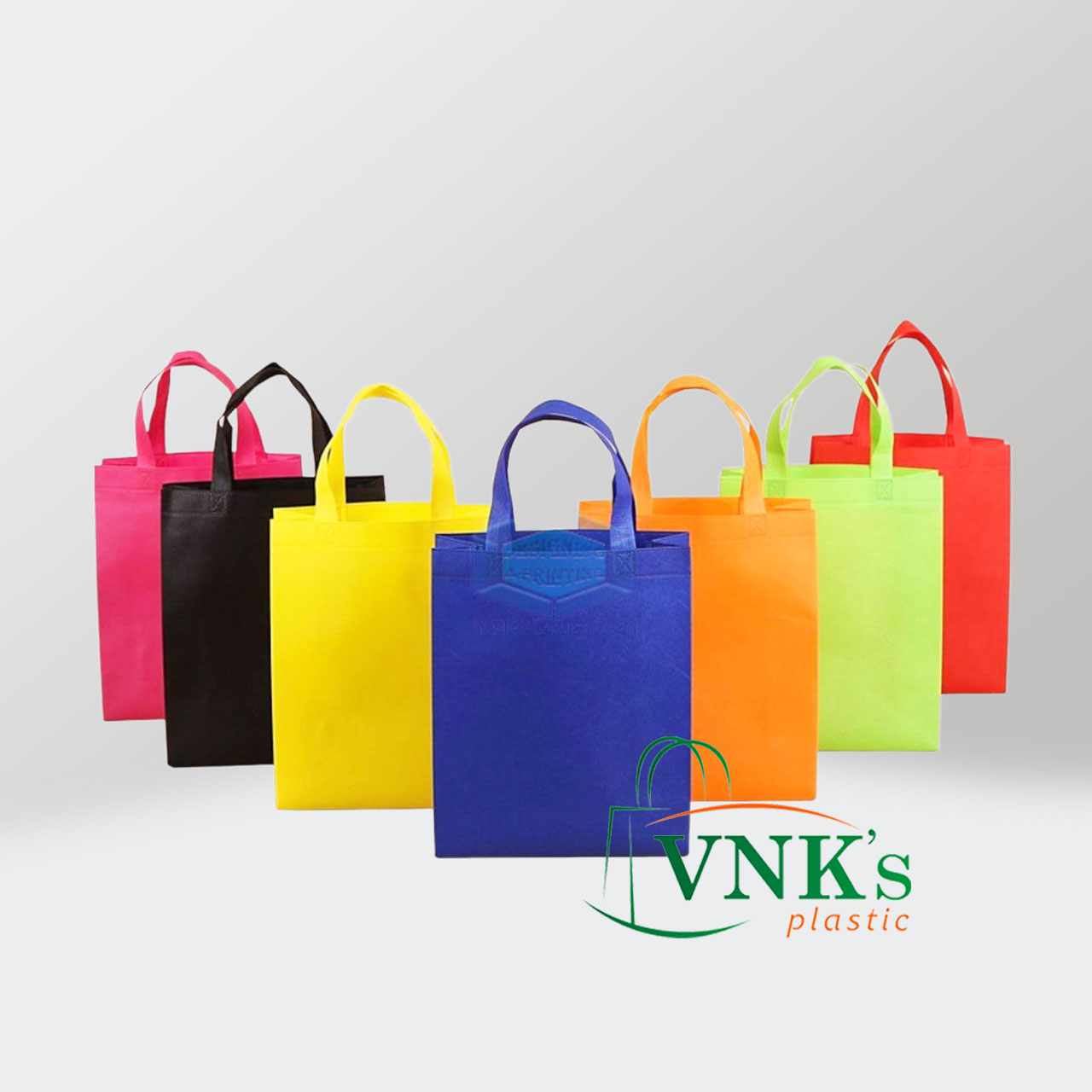 Non woven bag with multi-colored handles